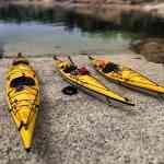 Kayaks pulled up for lunch in the San Juans